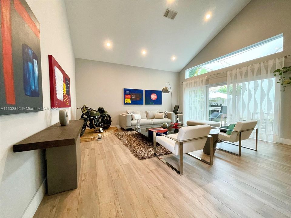 Open floorpan with a double height ceiling and modern and clean touches