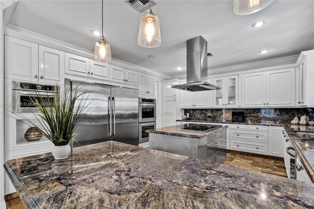 Custom Build Cabinets and Blue Bahia Granite Countertops