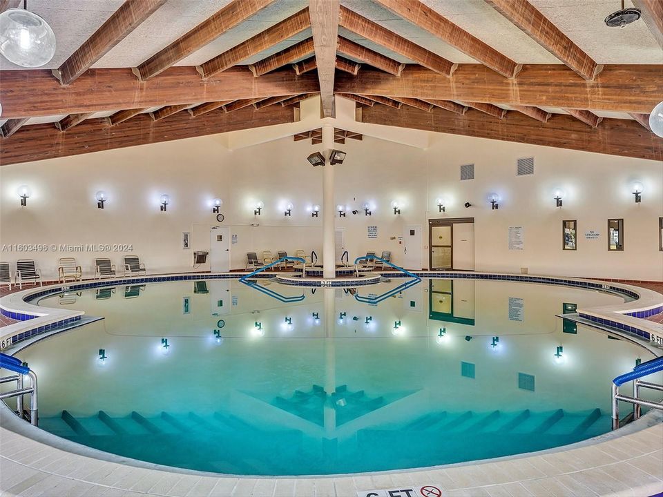 Beautiful clubhouse with plenty of amenities, including indoor and outdoor heated pools, a gym, racquetball and tennis courts, a theater, a billiard room, card rooms, a library, BBQ areas, and more.