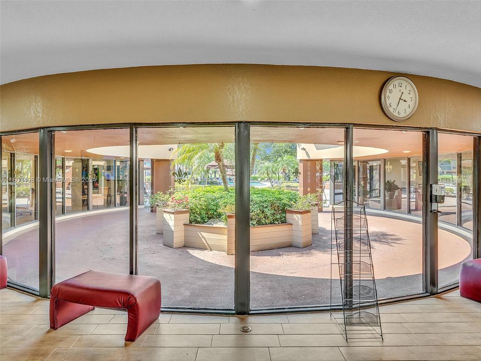 Beautiful clubhouse with plenty of amenities, including indoor and outdoor heated pools, a gym, racquetball and tennis courts, a theater, a billiard room, card rooms, a library, BBQ areas, and more.