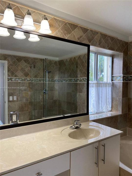 double vanity plus separate tub & shower
