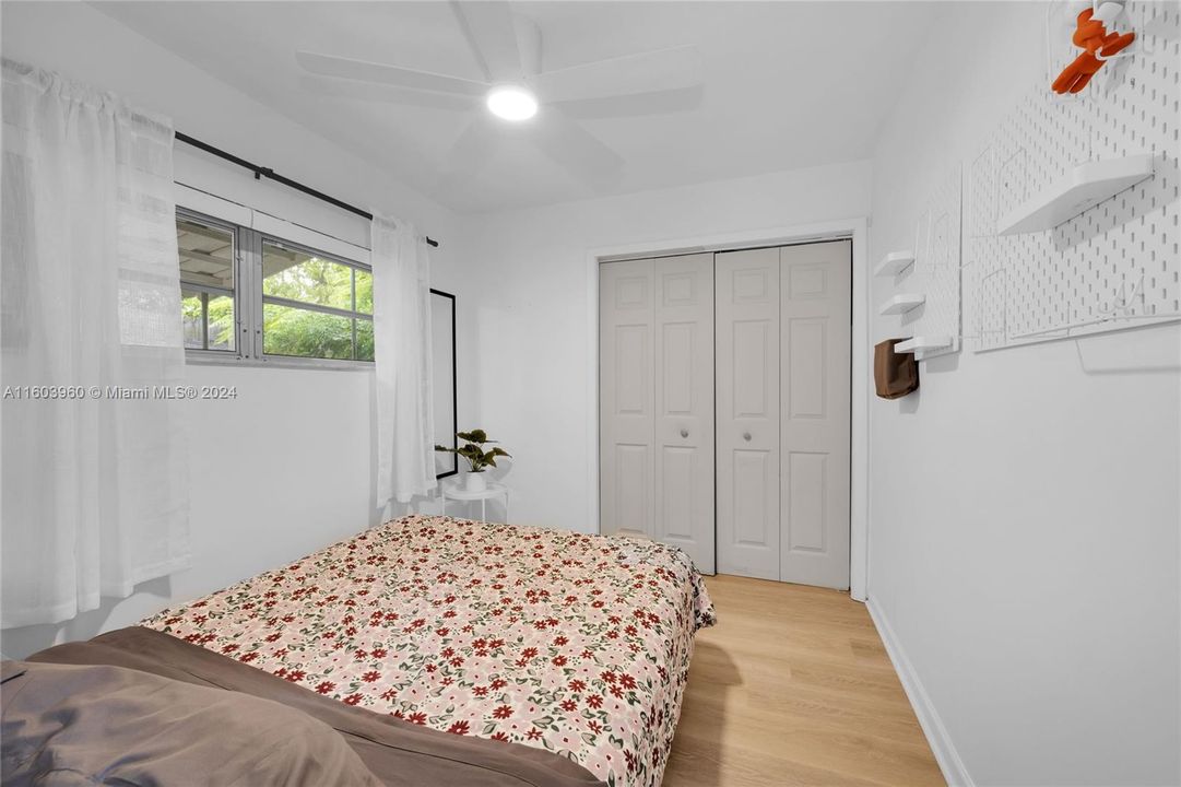 Guest House Bedroom with closet cabinetry.