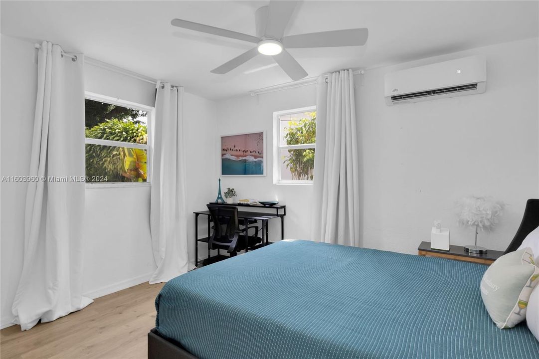 Bedroom with newer mini-split A/C system.