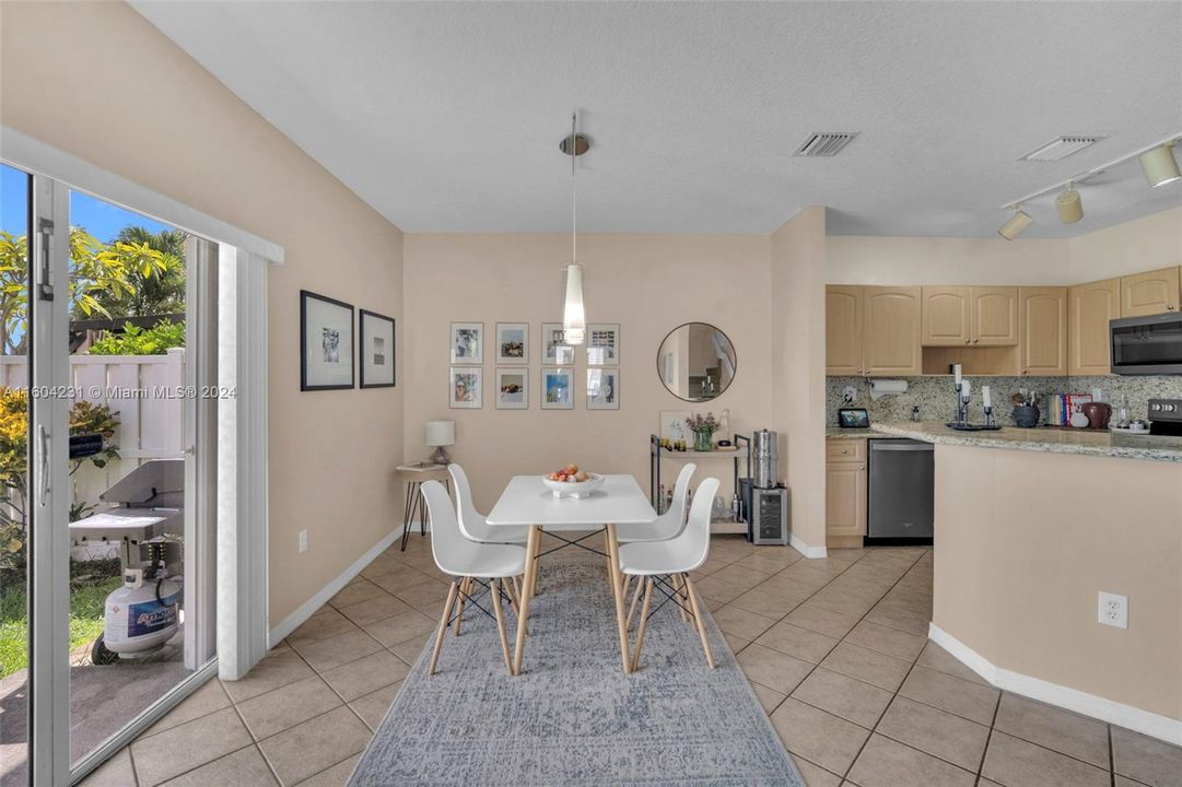 Dining area off of kitchen, with lake views.