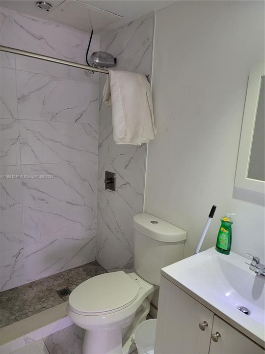 Office bathroom with shower