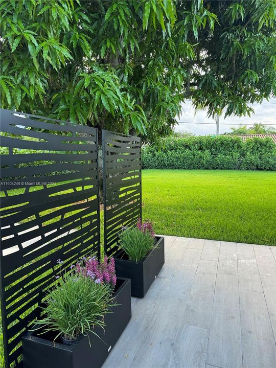 side patio view to backyard