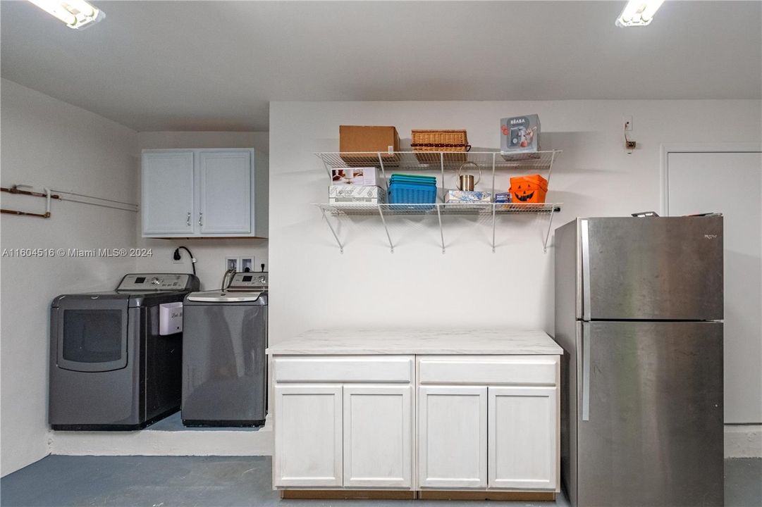 Laundry Room in Garage  ( Refrigerator does NOT Stay)