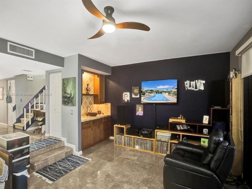 Step Down Main Living Space is enhanced with a entertaining wet bar space!