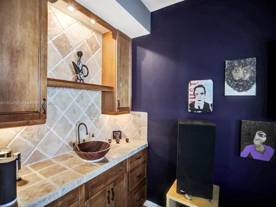 Coordinated Tile ed Backsplash Wine Bar and Cabinets and Enhanced Lighting!