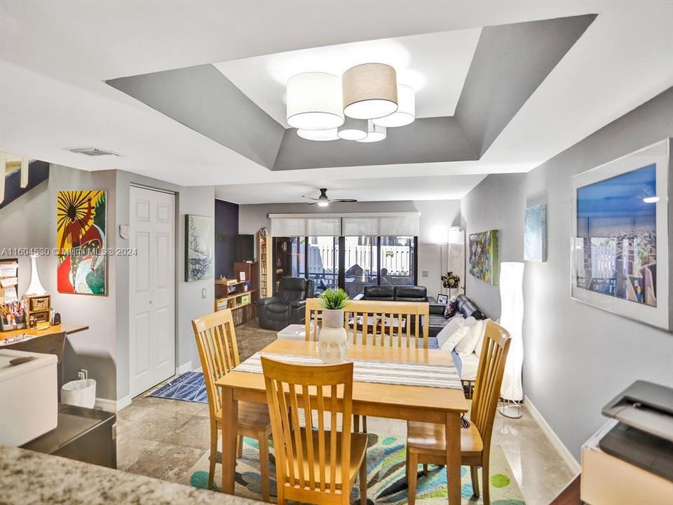 Formal elevated Dining Space with coved lighted ceiling!