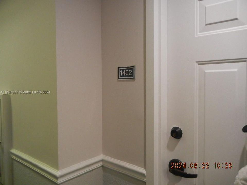 DOOR TO UNIT ENTRANCE