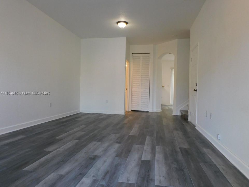 View to Living/Dining areas from entry way.