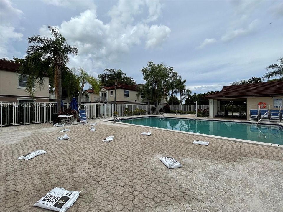 Pool deck is being refinished.