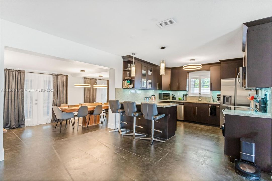Open kitchen with granite countertops