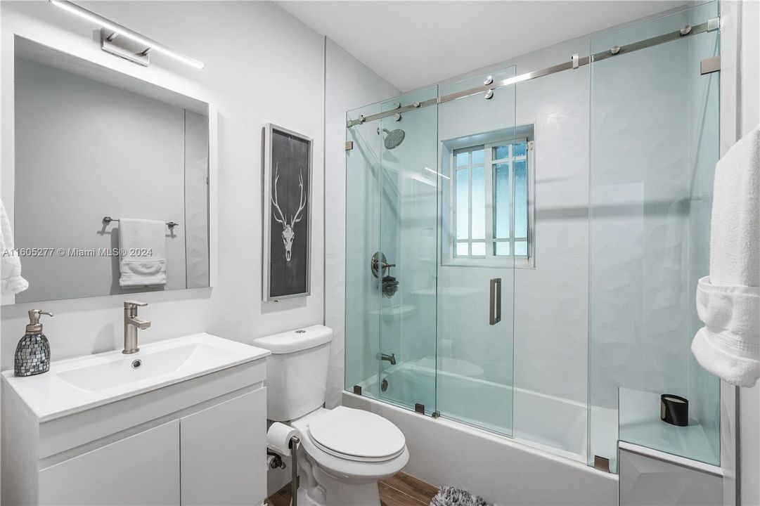 LAUNDRY ROOM WITH DOOR TO THE POOL AREA!