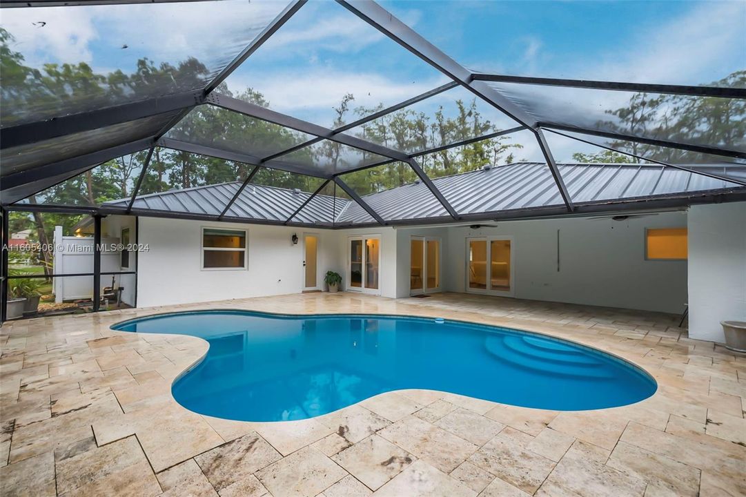 Pool And Screened in Patio