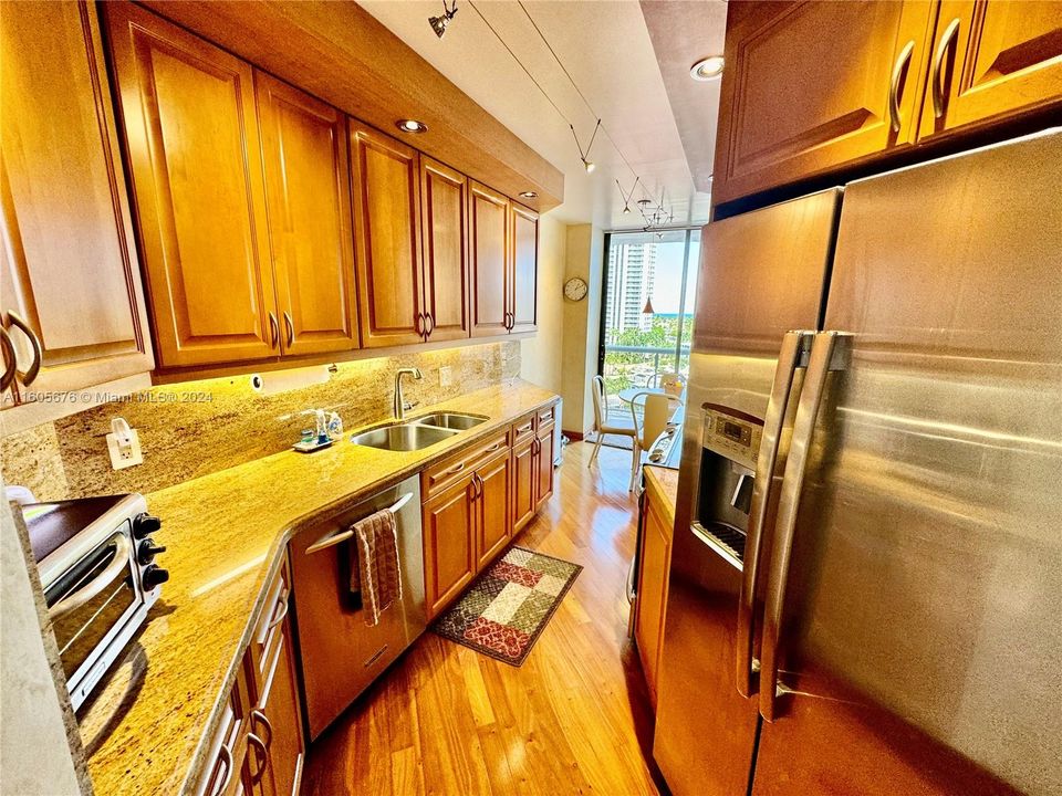 NEW CUSTOM DESIGNER SOLID CHERRY WOOD & CORSICAN GRANITE KITCHEN WITH CUSTOM BACKLIT AND CEILING "LED" LIGHTING