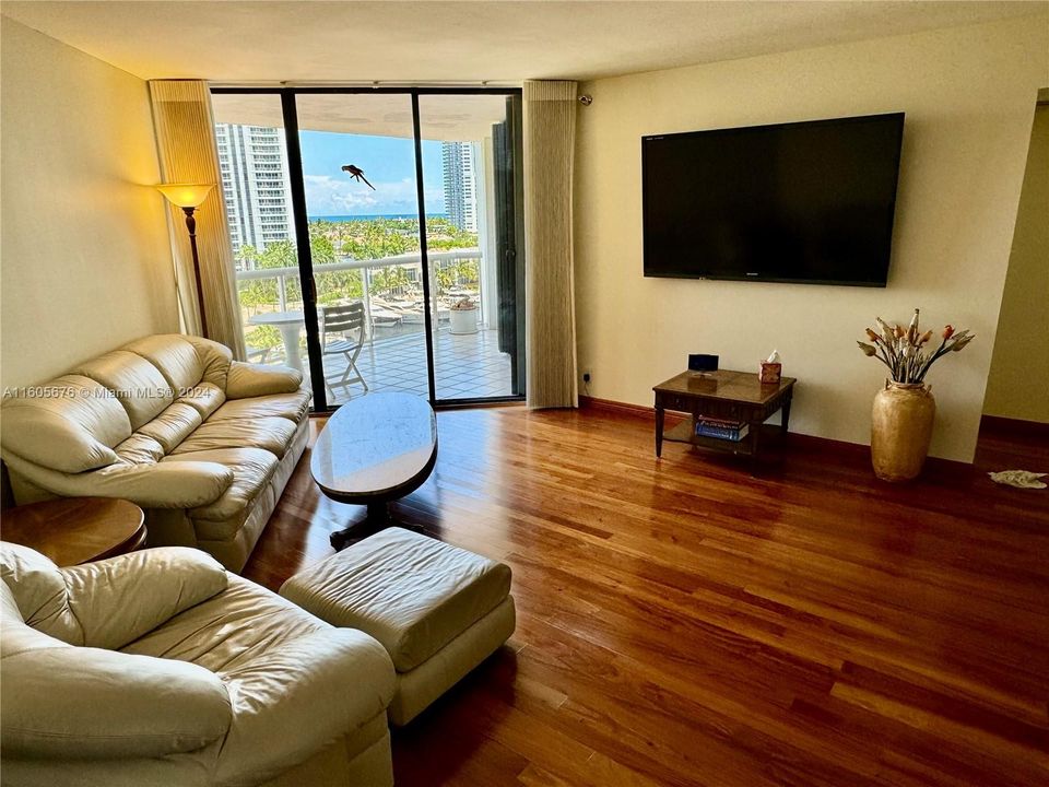 EXQUISITE NEW SOLID AMENDIUM BRAZILIAN HARDWOOD FLOORING THROUGHOUT LIVING AREAS.ENTIRE UNIT HAS JUST HAD ALL POPCORN REMOVED FROM CEILINGS AND COMPLETLY REPLASTERED AND PAINTED THROUGHOUT "TURNKEY" ELEGANT UNIT WITH THE BEST EAST VIEWS