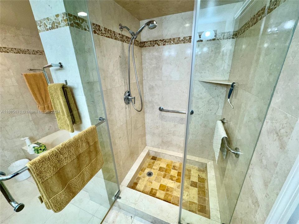 NEW CUSTOM DESIGNER SOLID CHERRY WOOD & CORSICAN GRANITE MASTER BATH WITH GOLD CRYSTALINE VESSLE SINKS AND CUSTOM  MARBLE FLOOR TO CIELING, AND CUSTOM STONE INLAYS ON THE WALLS AND IN THE SHOWER, "NONSLIP" TUMBLED MARBLE SHOWER FLOOR WITH BODY SPRAY