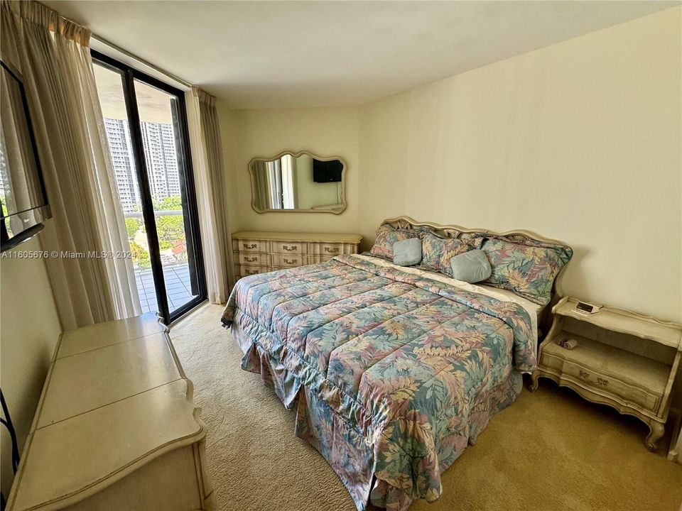 SECOND BEDROOM WITH WATERFRONT BALCONY EAST VIEWS