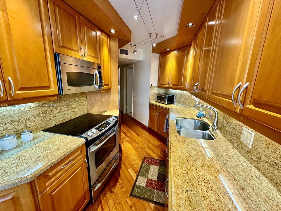 NEW CUSTOM DESIGNER SOLID CHERRY WOOD & CORSICAN GRANITE KITCHEN WITH CUSTOM BACKLIT AND CEILING "LED" LIGHTING