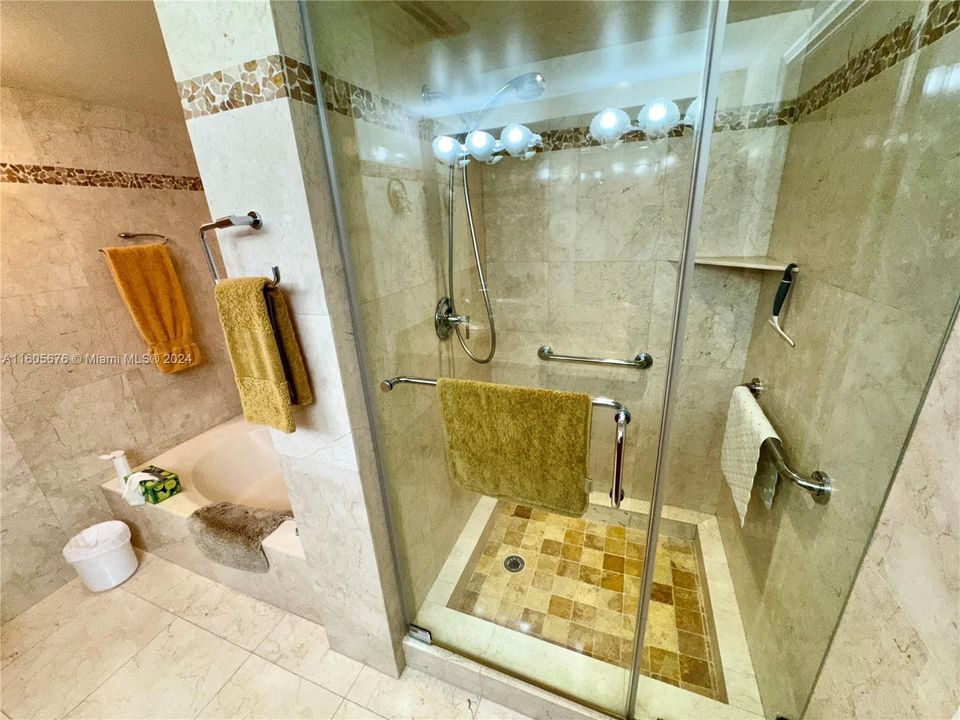 NEW CUSTOM DESIGNER SOLID CHERRY WOOD & CORSICAN GRANITE MASTER BATH WITH GOLD CRYSTALINE VESSEL SINKS AND CUSTOM  MARBLE FLOOR TO CIELING, WITH CUSTOM STONE INLAYS ON THE WALLS AND IN THE SHOWER, "NONSLIP" TUMBLED MARBLE SHOWER FLOOR WITH BODY SPRAY