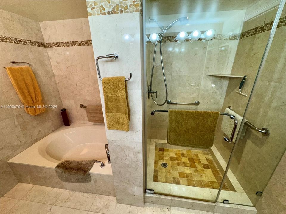 NEW CUSTOM DESIGNER SOLID CHERRY WOOD & CORSICAN GRANITE MASTER BATH WITH GOLD CRYSTALINE VESSEL SINKS AND CUSTOM  MARBLE FLOOR TO CIELING, WITH CUSTOM STONE INLAYS ON THE WALLS AND IN THE SHOWER, "NONSLIP" TUMBLED MARBLE SHOWER FLOOR WITH BODY SPRAY