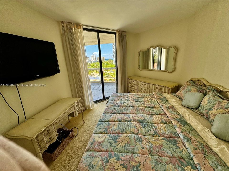 SECOND BEDROOM WITH WATERFRONT BALCONY EAST VIEWS