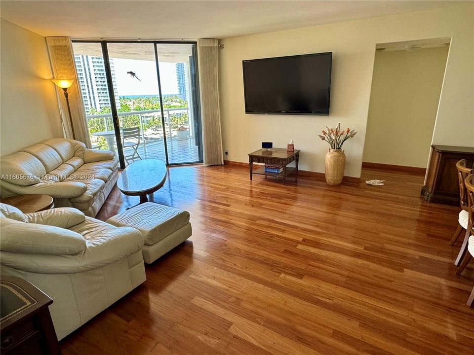 EXQUISITE NEW SOLID AMENDIUM BRAZILIAN HARDWOOD FLOORING THROUGHOUT LIVING AREAS.ENTIRE UNIT HAS JUST HAD ALL POPCORN REMOVED FROM CEILINGS AND COMPLETLY REPLASTERED AND PAINTED THROUGHOUT "TURNKEY" ELEGANT UNIT WITH THE BEST EAST VIEWS