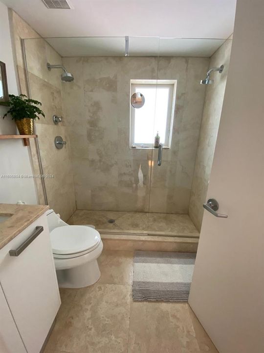 Double showers in master bathroom