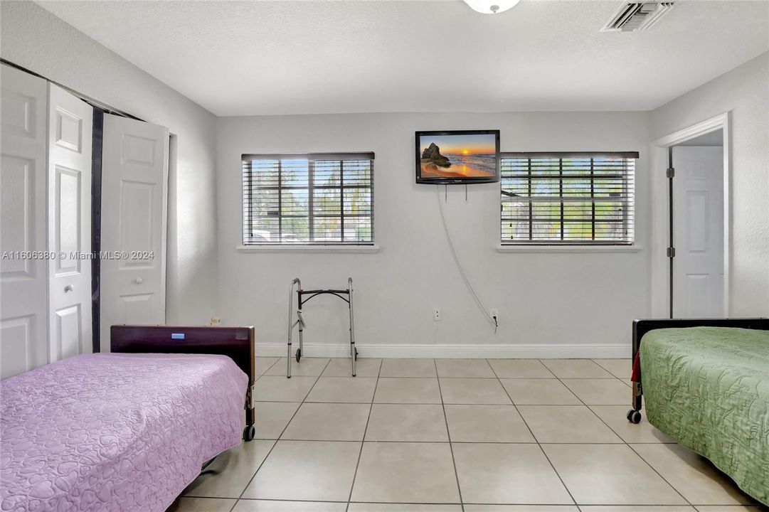 First bedroom located in the front of the house with an ensuite and wall to wall closet.