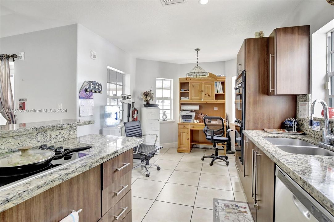 Double built-in wall oven as well as double sink.