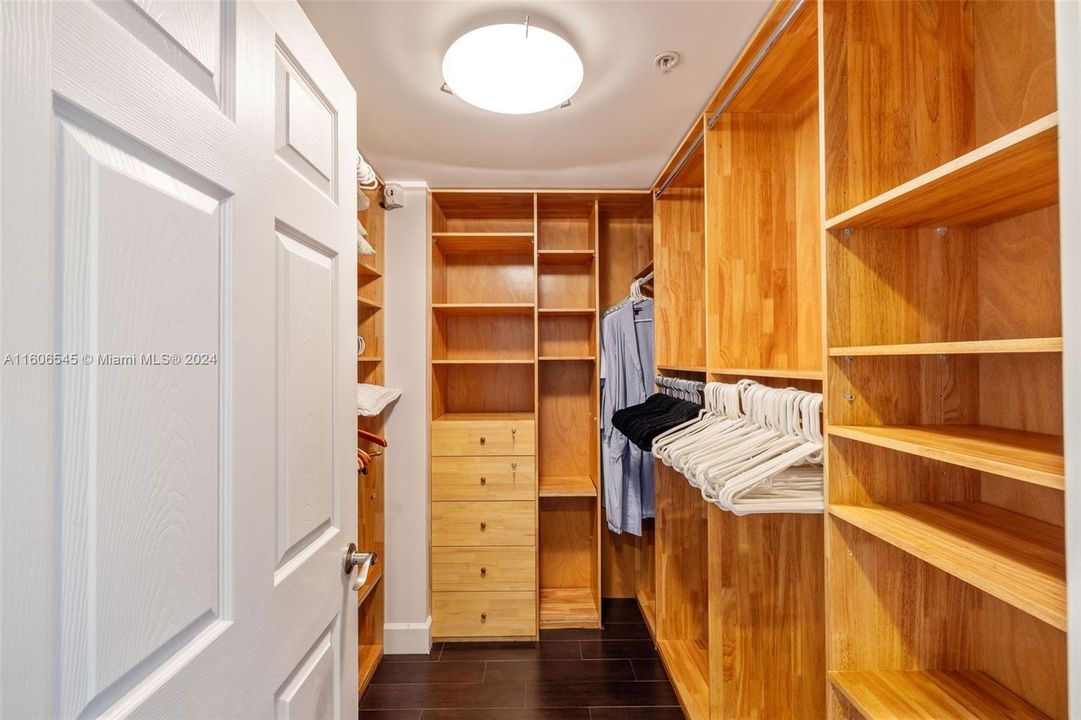 Huge Walkin closets with cabinetry