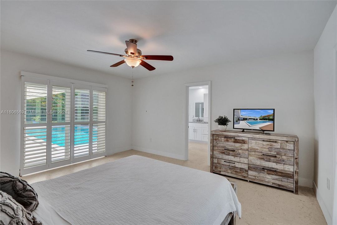 Master bedroom with pool view