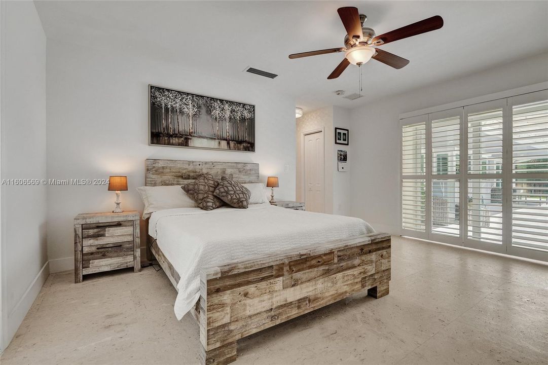 Master bedroom with pool view