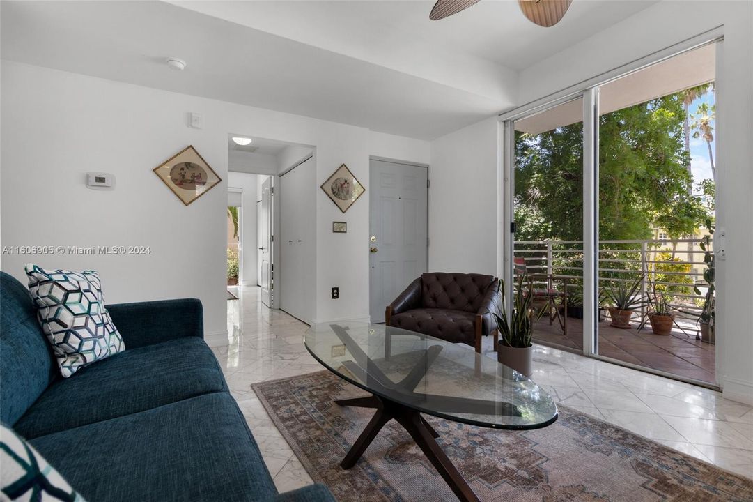 Bright living room with balcony