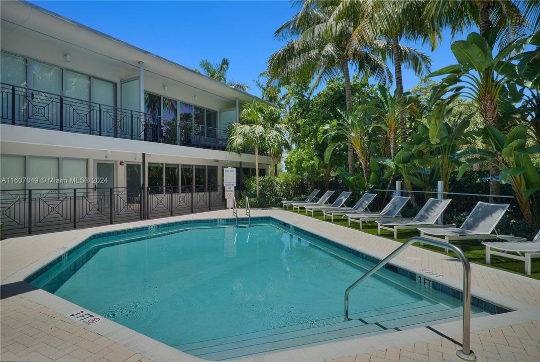 Second heated pool nestled in tropical landscaping