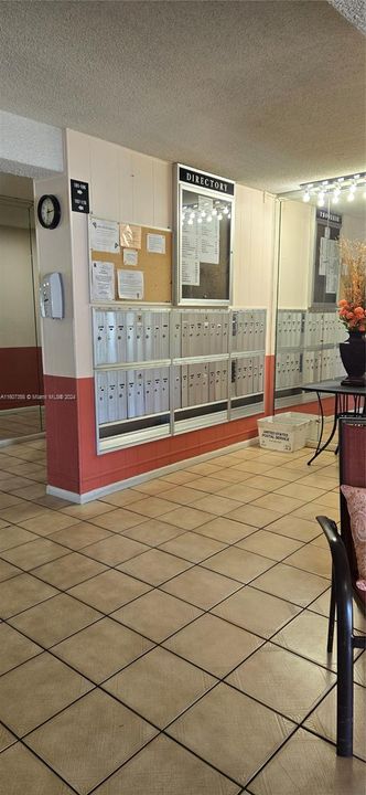 Main entrance to the building, Mail box and call box