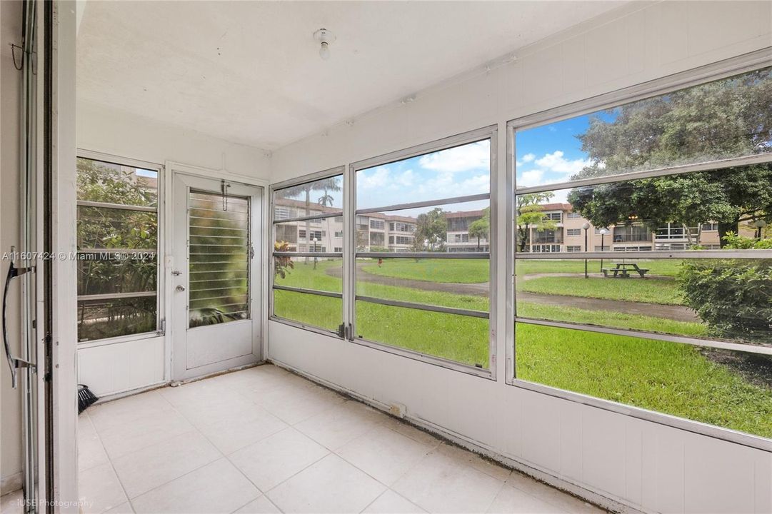 Enclosed Porch Is Like a Bonus Room, Tons of Light