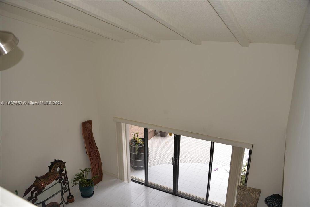 Cathedral ceiling in living room/ dining area.