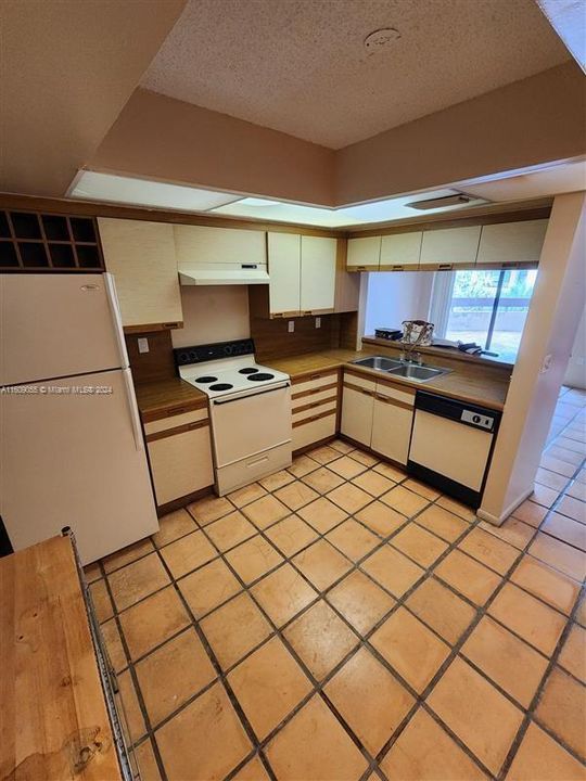 Includes refrigerator, stove/oven, dishwasher
