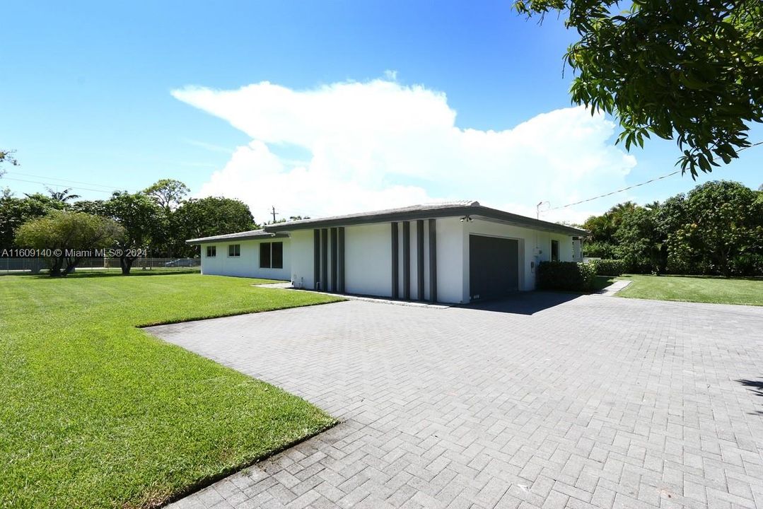 Ample driveway & 2 car garage