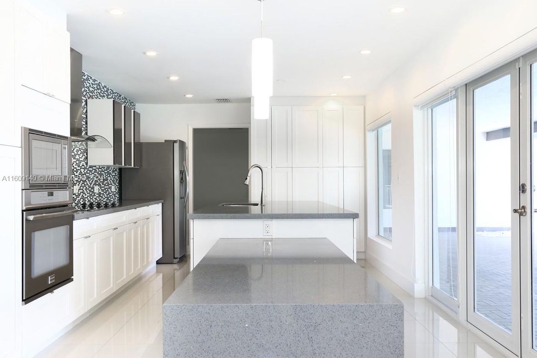 Beautiful modern kitchen, quartz counter tops