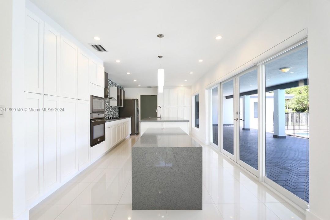 Spacious modern kitchen with lots of cabinets