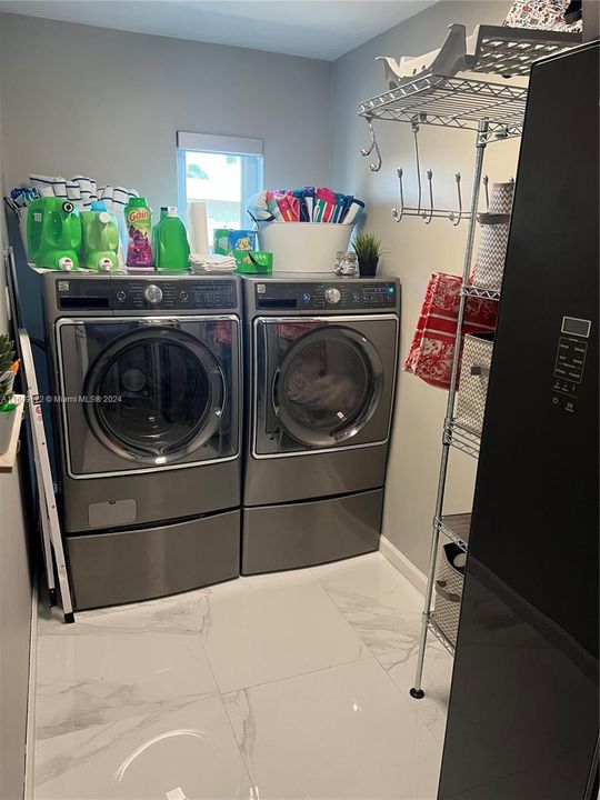 Laundry Room With Space and Ironing Closet