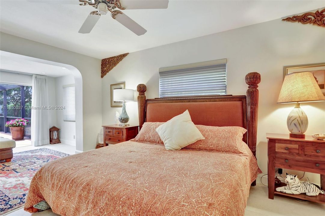 #1 Master Suite with views of the pool and natural light