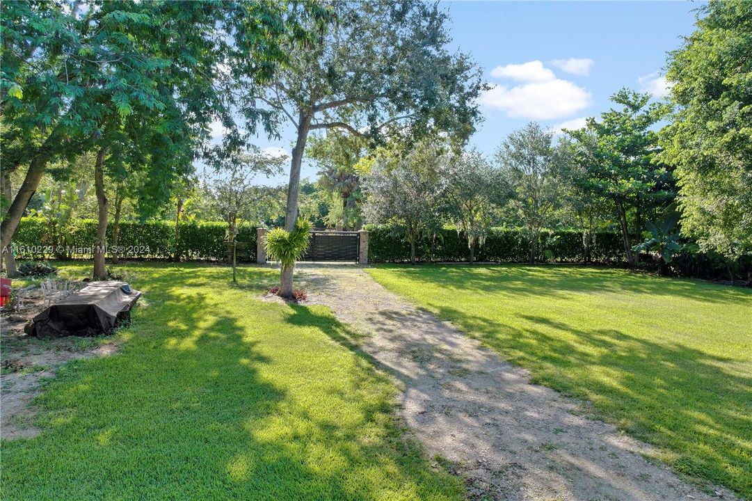 GRAVEL DRIVEWAY TO BBQ AREA PLUS