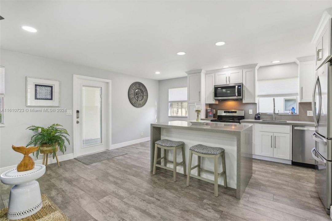 The kitchen is a chef's delight with its custom layout