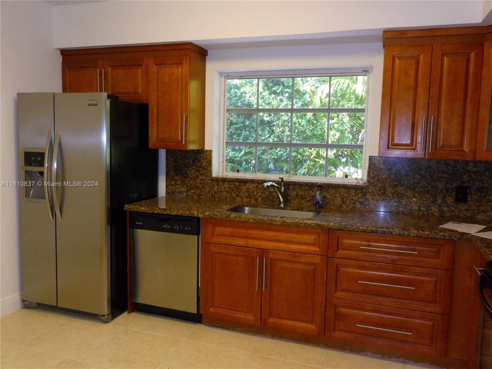 kitchen now has same floor as living area