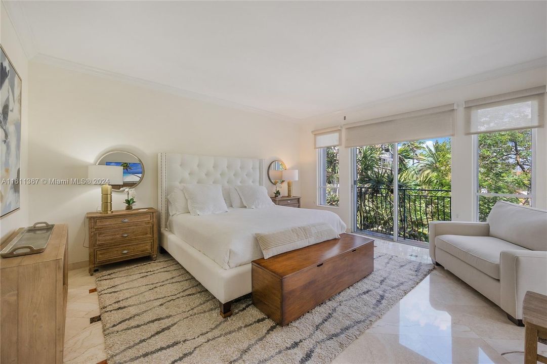 Illuminated and spacious Master Bedroom with balcony.